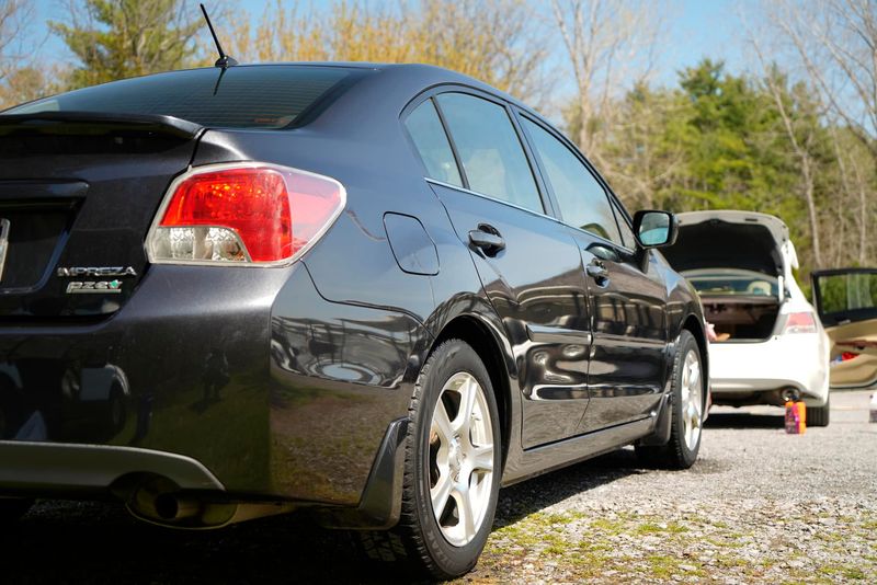 Freshly detailed Subaru receiving a professional mobile car wash by Pizarro's Mobile Detailing